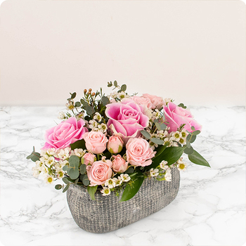 Arrangement floral piqué pour deuil Éloge