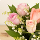 Bouquet avec du muguet et de la rose rose pour le 1er mai