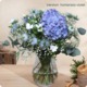 Bouquet rond Rio avec hortensia bleu ou violet, lisianthus, nigella et gypsophile – création florale fraîche et élégante