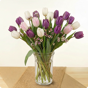 Bouquet de tulipes blanches, roses et violettes avec du wax