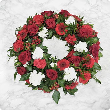 Couronne de fleurs pour deuil rouge Hommage Éternel