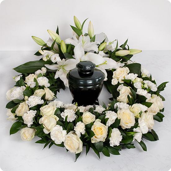 Couronne de fleurs Pour toujours avec des lys et des roses