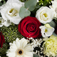 Coussin de fleurs Gaïa avec roses rouges, germinis blancs et feuillage vert pour cérémonie funéraire - 123fleurs