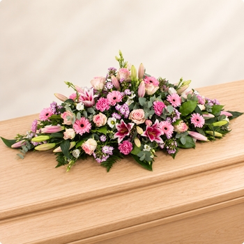 Hela, raquette de deuil dans une gamme de roses tendres