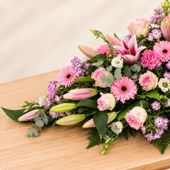 Hela, raquette de deuil dans une gamme de roses tendres